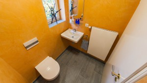 Gäste-WC Sanierung ohne Fliesen Zitzelsberger GmbH
